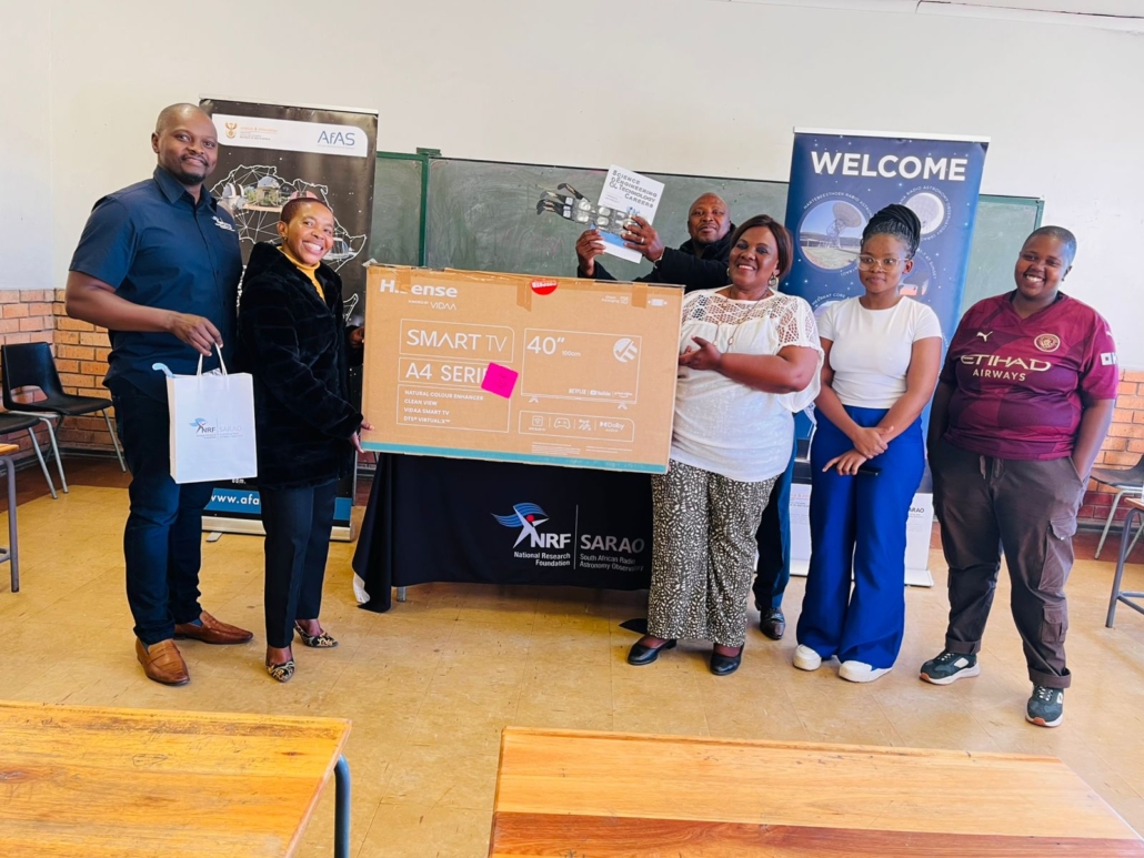 SARAO Science Engagement leads team donating equipment to schools as part of IAU-GA Legacy Project